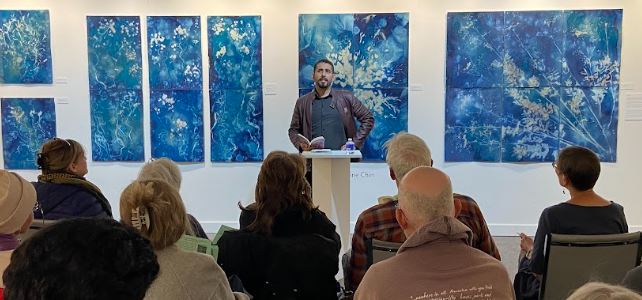 Mosab Abu Toha reciting his work, "Things You May Find Hidden In My Ear: Poems from Gaza" at ArtRage Gallery, April 25th 2023