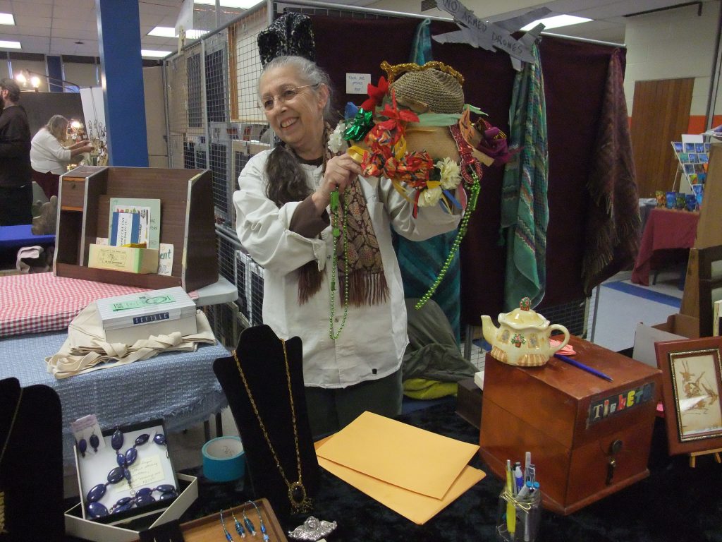 2014 Plowshares Craftsfair: Rae with her raffle hat